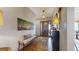 Inviting foyer with wood floors, stylish lighting, and decor at 11194 W Yucca, Littleton, CO 80125