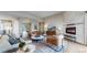 Warm and inviting living room with a marble fireplace and views at 11194 W Yucca, Littleton, CO 80125