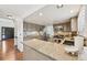 Bright and spacious kitchen featuring granite countertops, stainless appliances, and hardwood floors at 10068 Granite Hill Dr, Parker, CO 80134