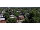 Aerial view of a neighborhood with lush green trees and various residential buildings at 1021 E 23Rd Ave, Denver, CO 80205