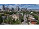 A high angle view featuring the Denver skyline, a church and residential homes at 1021 E 23Rd Ave, Denver, CO 80205