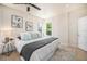 Bright bedroom with corner windows, neutral decor and ample natural light at 1021 E 23Rd Ave, Denver, CO 80205