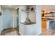 Cozy bar area featuring a wine rack, a countertop, and direct access to the kitchen at 1150 Vine St # 1006, Denver, CO 80206