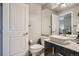 Modern bathroom boasts a vessel sink, sleek vanity, and contemporary fixtures at 1150 Vine St # 1006, Denver, CO 80206