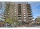 High-rise condo building with multiple balconies and brick facade at 1150 Vine St # 1006, Denver, CO 80206