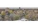 View of the residential neighborhood with mature trees and diverse architecture at 1150 Vine St # 1006, Denver, CO 80206