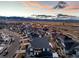 Panoramic aerial view capturing the neighborhood, a scenic landscape, and stunning sunset sky at 7895 Julsburg Cir, Littleton, CO 80125