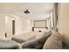 Spacious basement with comfortable seating area, carpet, and a projector screen at 7895 Julsburg Cir, Littleton, CO 80125