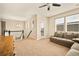 Cozy loft offers neutral walls, carpeted floor, and abundant natural light for reading and relaxation at 7895 Julsburg Cir, Littleton, CO 80125