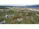Aerial view of a home with property lines outlined in red, highlighting its location at 17420 Caribou Dr, Monument, CO 80132