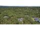 Overhead view of a home and surrounding landscape with trees for privacy and seclusion at 17420 Caribou Dr, Monument, CO 80132