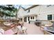 Relaxing backyard deck includes an outdoor grill, comfortable seating, and serene views of the surrounding greenery at 17420 Caribou Dr, Monument, CO 80132