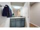 Well-lit bathroom features a vanity with storage, clean finishes, and a mirror that enhances natural light at 17420 Caribou Dr, Monument, CO 80132