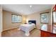 Bedroom with carpet flooring, window with blinds, neutral paint, closet, and dresser at 17420 Caribou Dr, Monument, CO 80132