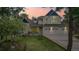Charming home with a well-manicured lawn, a three-car garage and an inviting entrance at 17420 Caribou Dr, Monument, CO 80132