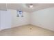 Unfinished basement with a small window and neutral flooring provides a blank canvas to personalize at 502 Nile St, Aurora, CO 80010