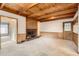 Spacious living room with a fireplace, and a carpeted floor at 502 Nile St, Aurora, CO 80010