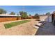 Backyard features a patio, outdoor furniture, manicured lawn, and shed at 5915 W 5Th Ave, Lakewood, CO 80226