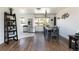 Open concept dining room and kitchen with hardwood floors at 5915 W 5Th Ave, Lakewood, CO 80226