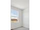 Bright bedroom with plush carpeting, a large window, and neutral paint at 6646 N Nepal St, Aurora, CO 80019
