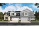 Charming two-story home with inviting curb appeal, garage, and professionally landscaped yard at 6646 N Nepal St, Aurora, CO 80019