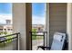Enjoy a morning coffee on this condo's private balcony with city and mountain views at 9258 Rockhurst St # 303, Highlands Ranch, CO 80129