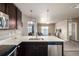Modern kitchen featuring stainless steel appliances and an open concept layout at 9258 Rockhurst St # 303, Highlands Ranch, CO 80129