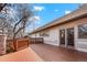 Spacious deck with decorative railing and access to the home at 11489 W Bear Creek Dr, Lakewood, CO 80227