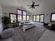 Bright main bedroom with great natural light, neutral decor, and inviting atmosphere at 11489 W Bear Creek Dr, Lakewood, CO 80227