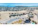 Community aerial view with residential homes, landscaping, and mountain backdrop on a clear day at 7447 Soapstone Way, Castle Rock, CO 80108