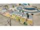 Aerial view of homes in a residential community with landscaped yards and mountain views at 7447 Soapstone Way, Castle Rock, CO 80108