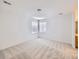 Bright bedroom with carpeted floor, window with blinds, and fresh white walls at 7447 Soapstone Way, Castle Rock, CO 80108