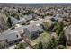 Aerial view of the home in a neighborhood with mature trees and landscaping, highlighting the property's location at 18263 E Berry Dr, Centennial, CO 80015