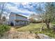 Expansive backyard with a well-maintained lawn and garden beds, perfect for outdoor activities and relaxation at 18263 E Berry Dr, Centennial, CO 80015