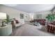 Spacious living room with carpet, neutral walls, and a classic seating arrangement for entertaining at 18263 E Berry Dr, Centennial, CO 80015