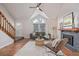 Comfortable living room features high ceilings, fireplace, and ample seating at 116 S Lindsey St, Castle Rock, CO 80104
