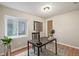 Charming office space with a wooden desk, globe, lamp, and a window view at 116 S Lindsey St, Castle Rock, CO 80104