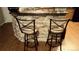 Kitchen featuring granite counter tops and stone backsplash on the breakfast bar at 785 Century Ln, Monument, CO 80132
