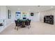 Basement game room featuring a card table, chairs, and a dart board at 960 Promontory Cir, Elizabeth, CO 80107