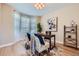 Cozy home office with stylish decor, natural light, and comfortable seating at 960 Promontory Cir, Elizabeth, CO 80107