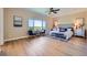 Serene main bedroom with scenic views, stylish furnishings, and ample natural light at 960 Promontory Cir, Elizabeth, CO 80107