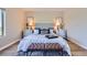 Well-appointed main bedroom with stylish decor, scenic views, and comfortable seating at 960 Promontory Cir, Elizabeth, CO 80107