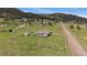 Charming single story home in a mountain community, surrounded by open land and trees at 11173 Emerald Ln, Conifer, CO 80433
