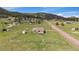 Charming single story home with porch and a fenced yard in a mountain community at 11173 Emerald Ln, Conifer, CO 80433