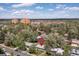Aerial view displaying the property's surroundings, including neighborhood homes and distant cityscape at 270 31St St, Boulder, CO 80305