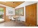 Cozy dining area featuring a built-in bench and a door leading to the outdoors at 270 31St St, Boulder, CO 80305