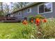 Beautiful backyard with lush flowers and a well-maintained lawn, enhancing the outdoor living space at 270 31St St, Boulder, CO 80305