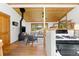 Open concept living area featuring a wood stove, comfortable seating, and wood ceilings at 270 31St St, Boulder, CO 80305