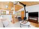 Open living room with wood ceilings, a fireplace and views to the kitchen at 270 31St St, Boulder, CO 80305