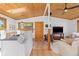 Spacious living area with wood ceilings, a television, and cozy seating arrangement at 270 31St St, Boulder, CO 80305
